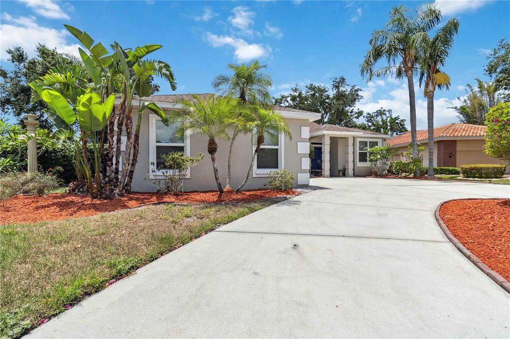 Photo of 6110 Misty Oaks Street, Sarasota, FL 34243 (MLS # A4650478)