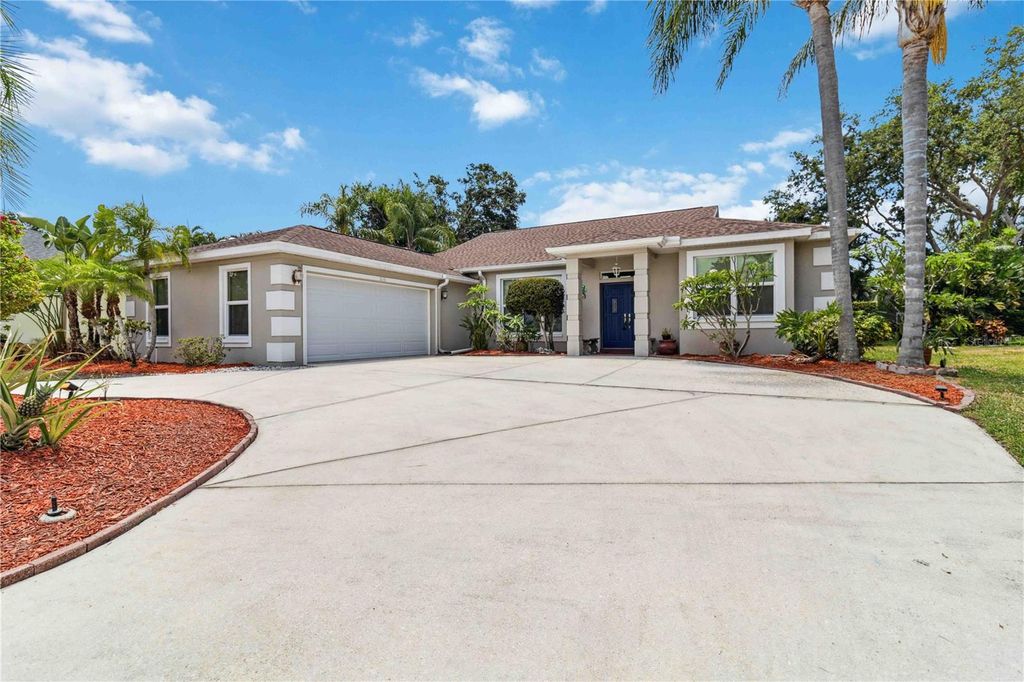 Photo of 6110 Misty Oaks Street, Sarasota, FL 34243 (MLS # A4650478)