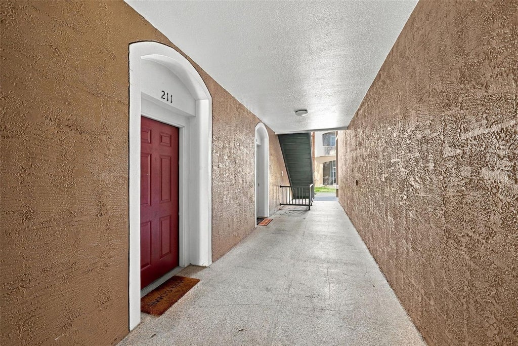 Photo of 7135 Yacht Basin Avenue #211, Orlando, FL 32835 (MLS # O6440343)