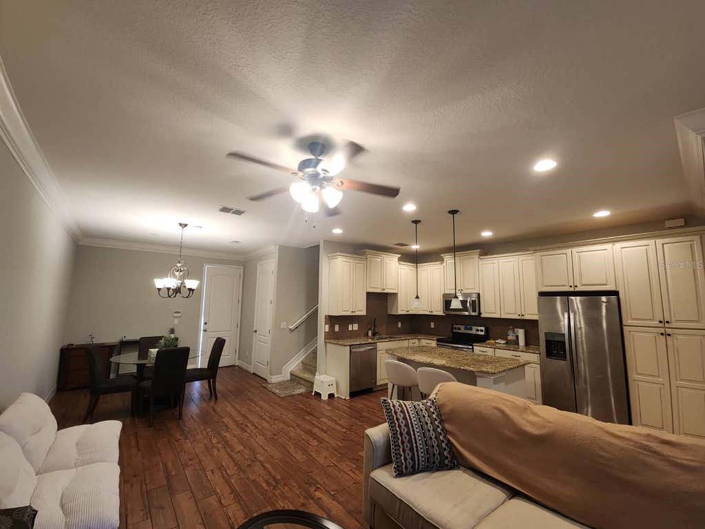 Photo of 10052 Eagle Creek Center Boulevard, Orlando, FL 32832 (MLS # O6430711)
