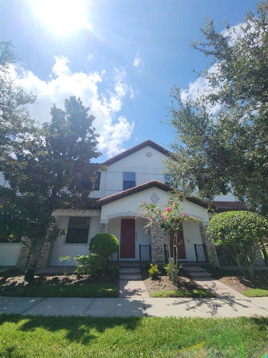 Photo of 10052 Eagle Creek Center Boulevard, Orlando, FL 32832 (MLS # O6430711)
