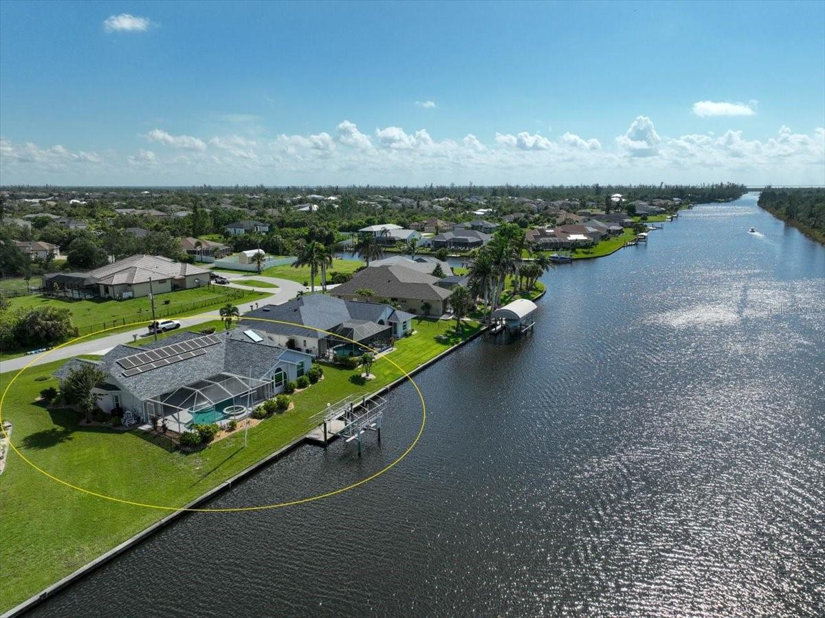 Sailboat Access – No Bridges to the Gulf! Are you searching for the ultimate waterfront deal—where sailboat access, open water, and value all come together? Look no further! Skip the long, no-wake canal rides and enjoy direct access to the Gulf of Mexico with no bridges in your way. Located on a quiet street along the scenic Santa Cruz Waterway, this custom-built Newport home has everything you need—and more.
Step inside to discover a spacious and thoughtfully designed layout featuring 3 bedrooms, 2 full baths, an oversized garage, a pool bath, a formal dining room, plus both living and family rooms. The open floor plan offers stunning water views from nearly every room. Outside, relax in your heated pool and spa, all overlooking the peaceful waterway and tranquil nature preserve backdrop—your own private paradise.
The home sits on an oversized lot in an X flood zone and features a concrete seawall, dock with covered electric boat lift, water and electric at the dock, and solar electric system. Additional upgrades include impact windows, storm shutters, and a Generac whole-house generator—everything you need for comfort, security, and peace of mind.
With just a few personal touches or updates, this home could easily become your waterfront dream. Don’t miss this rare opportunity—schedule your private showing today!