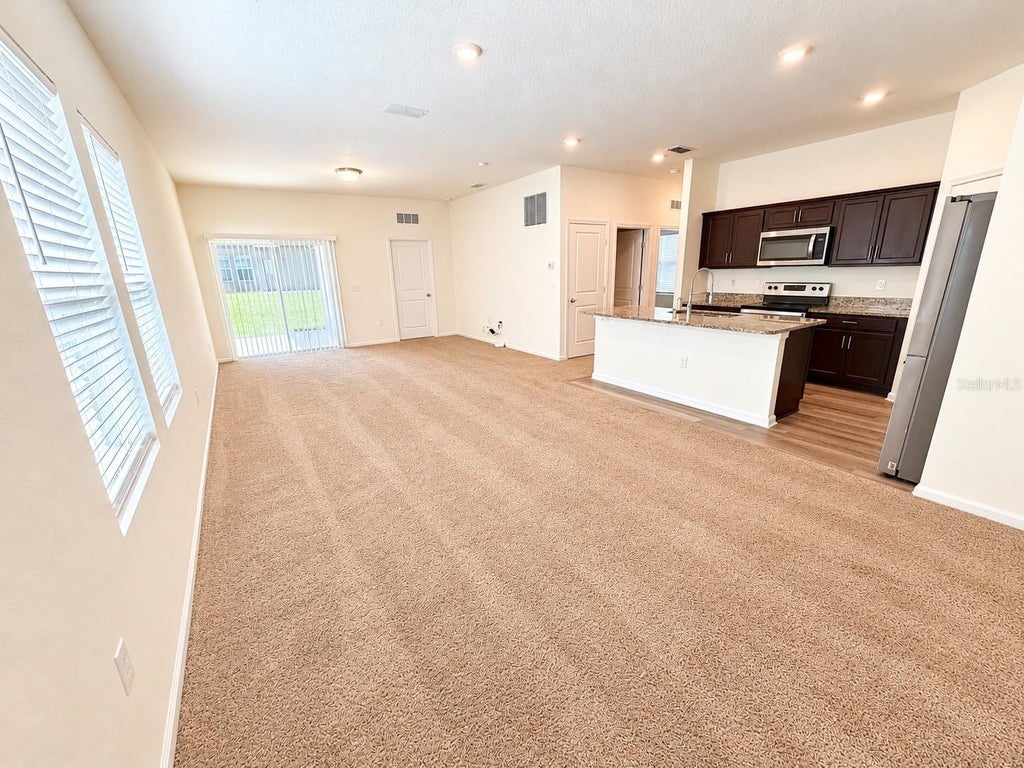 Photo of 764 Orchid Grove Boulevard, Davenport, FL 33837 (MLS # S5160068)