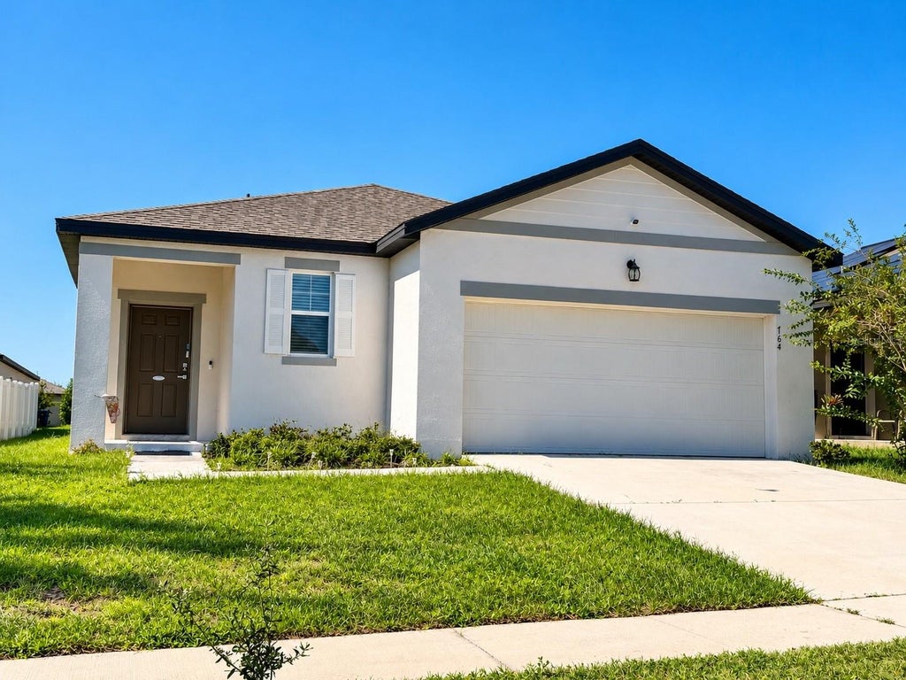 Photo of 764 Orchid Grove Boulevard, Davenport, FL 33837 (MLS # S5160068)