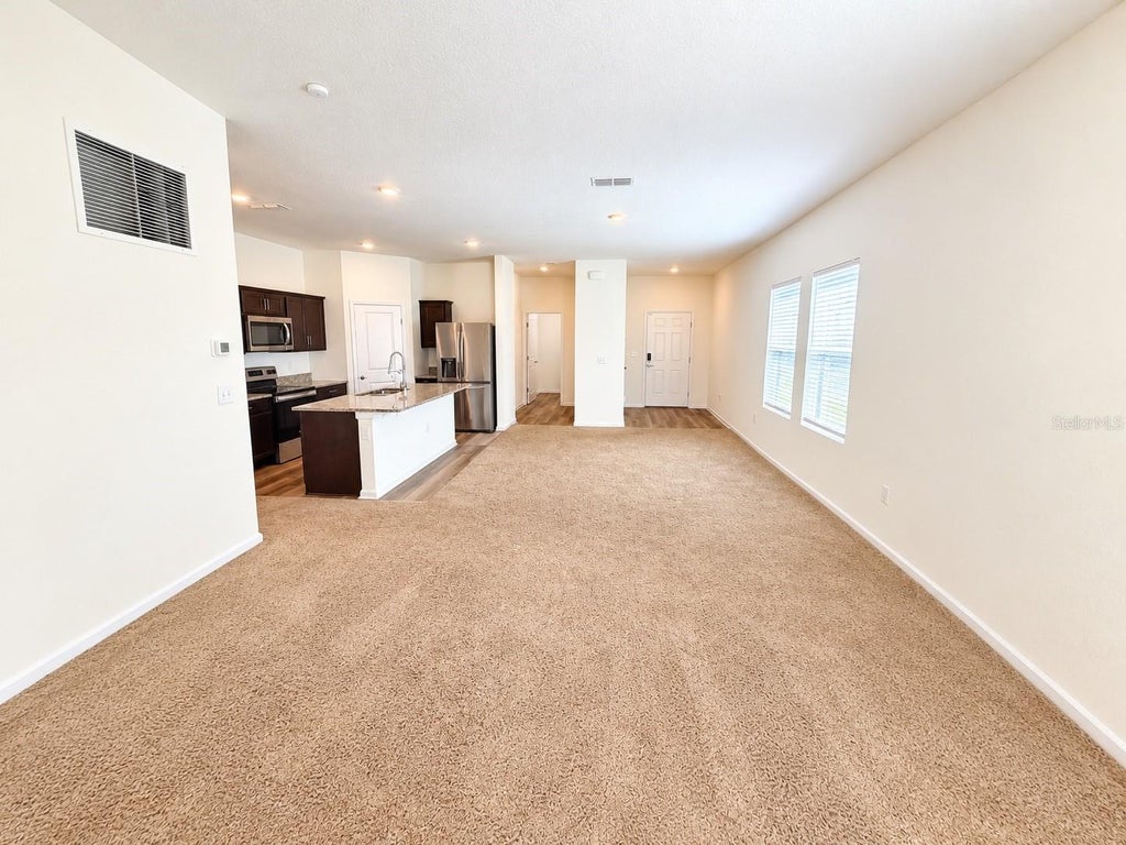 Photo of 764 Orchid Grove Boulevard, Davenport, FL 33837 (MLS # S5160068)