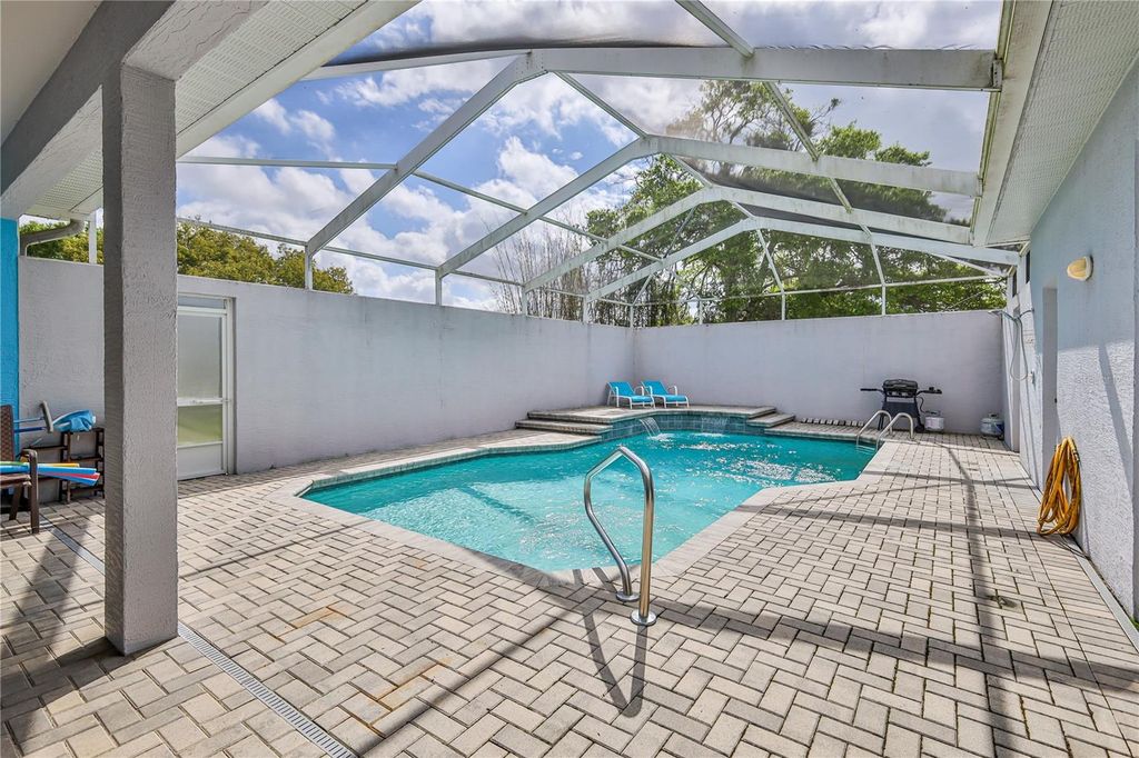 Photo of 12390 Glen Haven Street, Spring Hill, FL 34609 (MLS # W7883919)