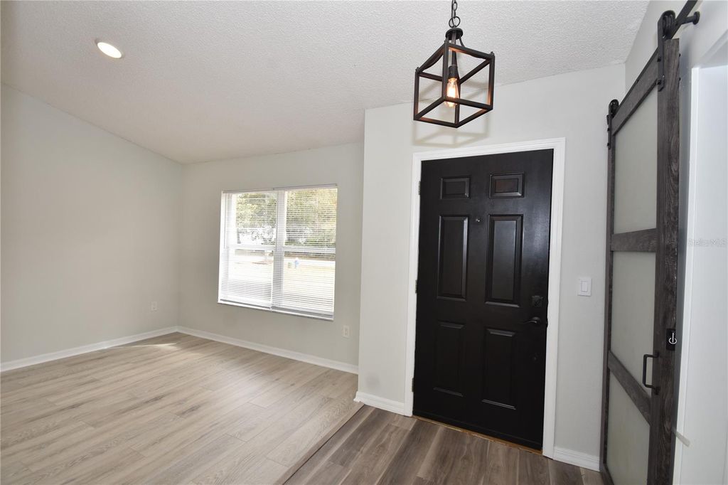 Photo of 77 Pebble Beach Drive, Palm Coast, FL 32164 (MLS # FC316188)