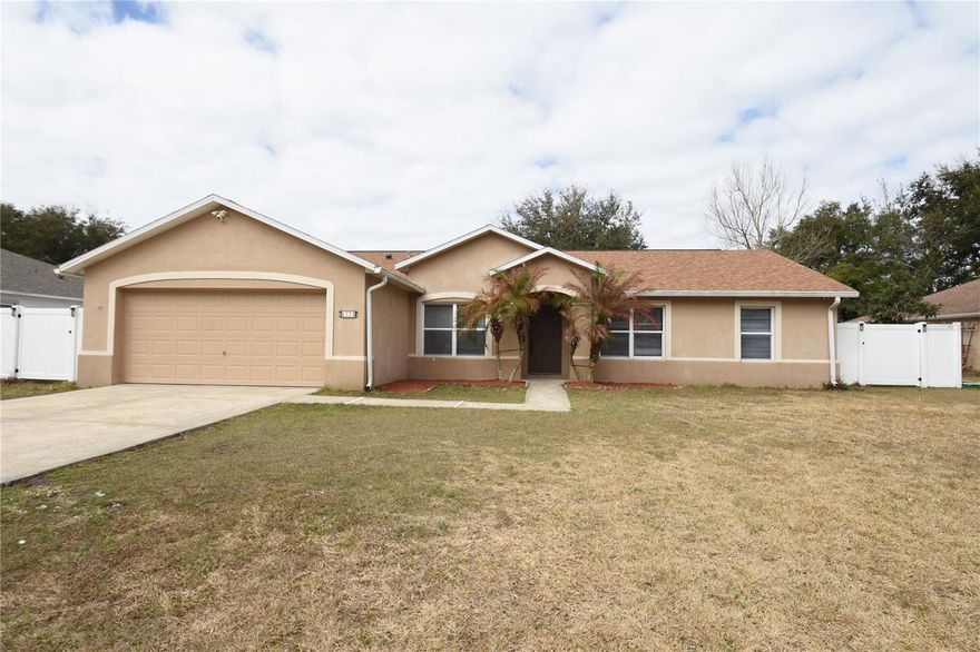 Beautifully updated 4-bedroom, 2-bath home located in the desirable Belle Terre subdivision! This move-in-ready property showcases premium upgrades and thoughtful improvements throughout. The freshly painted interior features vinyl and laminate flooring, recessed lighting, and a stunning built-in stone fireplace that serves as the focal point of the living space.The kitchen has been tastefully renovated with quartz countertops and updated appliances, offering both style and functionality. The primary suite features a luxury smart toilet, while additional smart home enhancements include smart switches, a smart thermostat, and a camera doorbell.Major system upgrades provide peace of mind, including a tankless electric water heater, plug in for generator with interlock switch, roof and AC replaced within the last 5 years, gutters, updated switches, outlets, and smoke detectors, and pre-plumbing ready for a central vacuum system.Step outside to enjoy the privacy white vinyl fence that completes this exceptional home. A perfect blend of modern convenience and comfort—schedule your showing today!