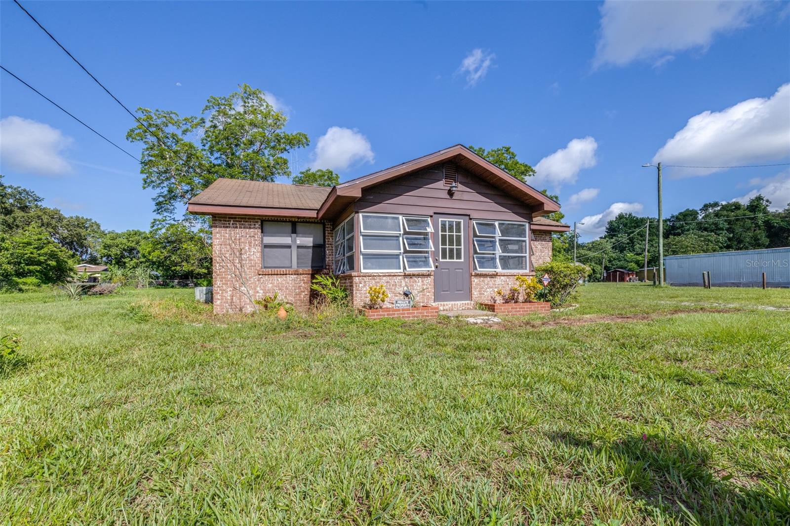 Want a home with lots of space! Unlock the full potential of this three-bedroom, one-and-a-half bathroom home nestled on a generous ½ acre of land. No HOA restrictions—giving you the freedom to have a boat, RV, or side-by-side, there’s plenty of room to park, play, and personalize. Whether you're a first-time buyer or an investor with a vision, this charming property offers ample space and opportunity to create something truly special.
