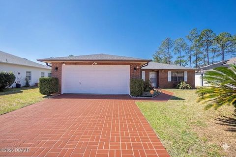Photo of 6 Westgrill Drive, Palm Coast, FL 32164 (MLS # FC316585)