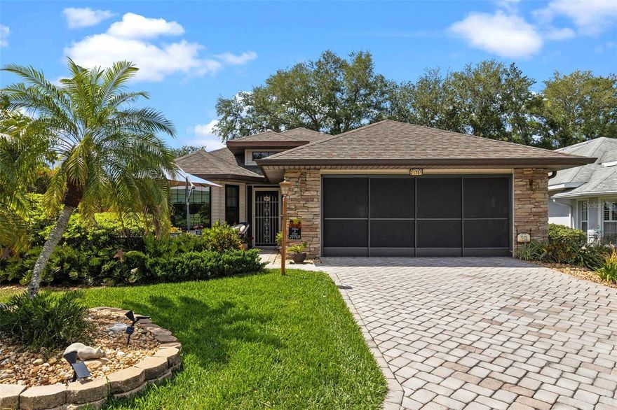 You will love the LAKE VIEWS from the FRONT PATIO and eat-in kitchen in this warm and charming OPAL MODEL that features EFFICIENT USE OF SPACE.  The KITCHEN SPARKLES with elegant cabinet hardware, CUSTOM-MADE WINDOW TREATMENTS and a fun, contemporary chandelier over the table.  There are OODLES OF CABINETS and UPDATED STAINLESS STEEL APPLIANCES that include a gas stove, a FRENCH-DOOR REFRIGERATOR, a hood plus a dishwasher.  The LIVING SPACES have easy-to-maintain, CAREFREE LAMINATE FLOORING and THREE (3) BRIGHT & CHEERY solar tubes were added for extra natural light.  The primary bedroom has TWO WALK-IN CLOSETS and space for king size furniture.  The ensuite bathroom features a walk-in shower, dual sinks, and a rainfall pattern window.  There are TWO GOOD-SIZE GUEST BEDROOMS in a separate hallway with a GUEST BATH between them giving guests (and you) ADDED PRIVACY.  The “L” shaped LANAI is SPACIOUS and IDEAL FOR ENTERTAINING.  A SUPER-SIZED PATIO was added for extra ENTERTAINING SPACE.  Pick fresh lemons from your very own LEMON TREE; and you are just steps away from FISHING!  Energy-efficient DOUBLE PANE WINDOWS were installed in 2023, extra insulation was added to the attic and the gutters were upgraded with 6 INCH “LEAF GUARD” GUTTER GUARDS. There is a WHOLE-HOUSE FILTRATION SYSTEM, the ROOF was replaced in 2025 and a new HVAC SYSTEM was installed in 2016.  This is your opportunity to OWN A HOME WITH LOTS OF ADDED VALUE in this lovely community. TERMITE BOND, whole-house INSULATION ADDED TO ATTIC, WHOLE-HOUSE SURGE PROTECTOR, and outside 30 amp interlock system for portable generator.  Located in the premier GOLF COURSE 55-plus community of ROYAL HIGHLANDS, residents enjoy a full range of amenities, including CABLE & HIGH-SPEED, FIBER OPTIC INTERNET, a GATED entrance with attendants, a GOLF COURSE, a RESTAURANT, tennis, PICKLEBALL, softball, INDOOR & OUTDOOR POOLS, secured RV STORAGE, bocce, shuffleboard, a FITNESS ROOM, a library, arts and crafts, billiards, catch-and-release fishing, and a variety of clubs. There truly is SOMETHING FOR EVERYONE in this vibrant community!