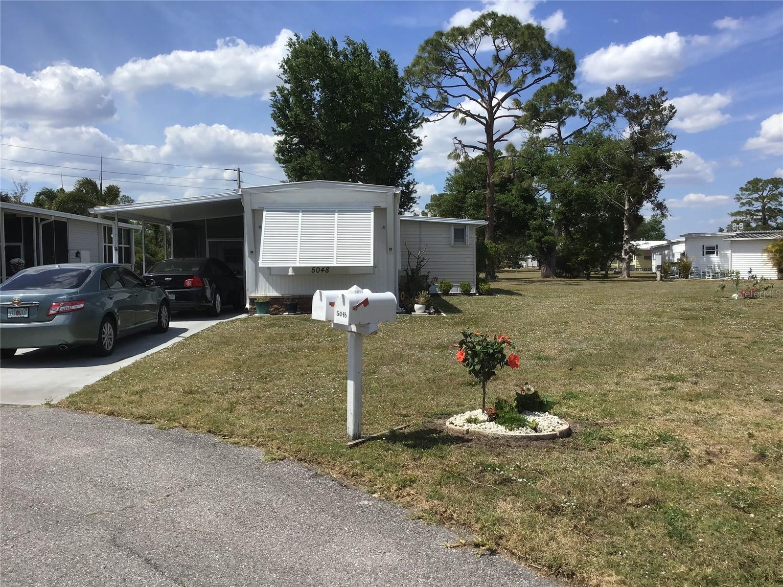 PET SECTION.... CUL DE SAC ... 3 BEDROOMS .... OVERSIZED LOT ... HUGE SHED .... ACCORDIAN SHUTTERS .... & SO MUCH MORE!
LOCATED IN HOLIDAY PARK A LAND OWNED 55+ GATED COMMUNITY PLUS ITS IN THE PET SECTION AND ON A QUIET CUL DE SAC. THIS IS A RARE FIND, 3 BEDROOMS & 2 BATHS, PRIMARY BEDROOM WITH A PRIVATE BATH AND EXIT DOOR. 2ND BEDROOM ALSO HS EXIT DOOR AND THE 3RD BEDROOM COULD BE ALSO BE USED AS AN OFFICE. THE HUGE SHED HOUSES THE WASHER & DRYER WITH PLENTY OF STORAGE, NEWER WINDOWS, ACCORDION SHUTTERS, SCREENED LANAI, OVERSIZED PIE SHAPED LOT AND SO MUCH MORE!
HOLIDAY PARK HAS MANY AMENITIES 2 POOLS,LIBRARY, LAUNDRY, FITNESS ROOM, BOCCE, TENNIS & PICKLEBALL COURTS, SHUFFLEBOARD, ARTS & CRAFTS AND MUCH MORE! MOTIVATED SELLER!