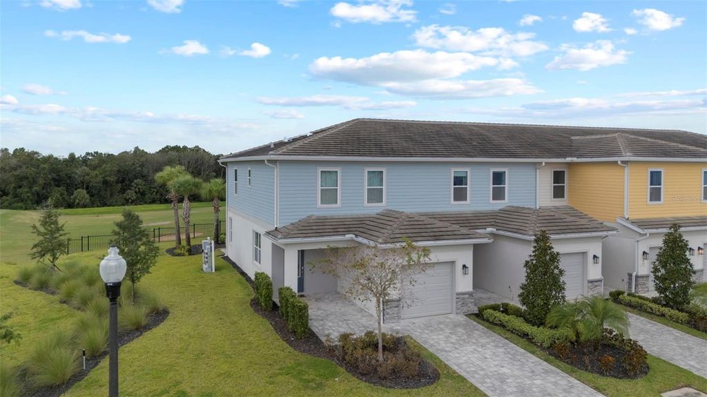 Photo of 844 Driving Range Court, Reunion, FL 34747 (MLS # O6344423)
