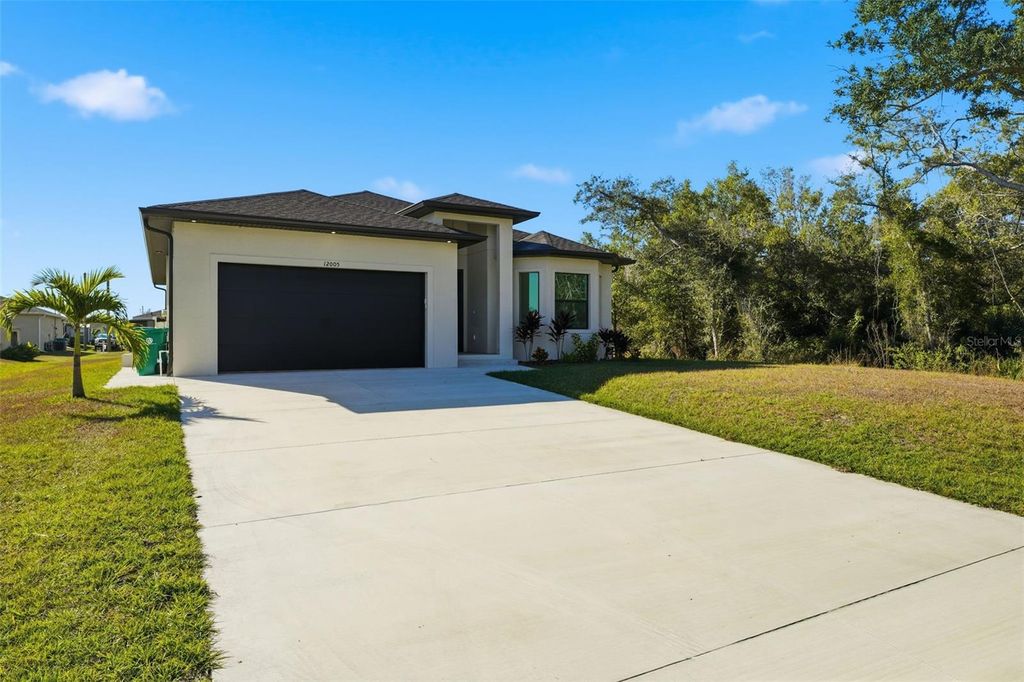 Photo of 12005 Carnival Avenue, Port Charlotte, FL 33981 (MLS # N6142116)