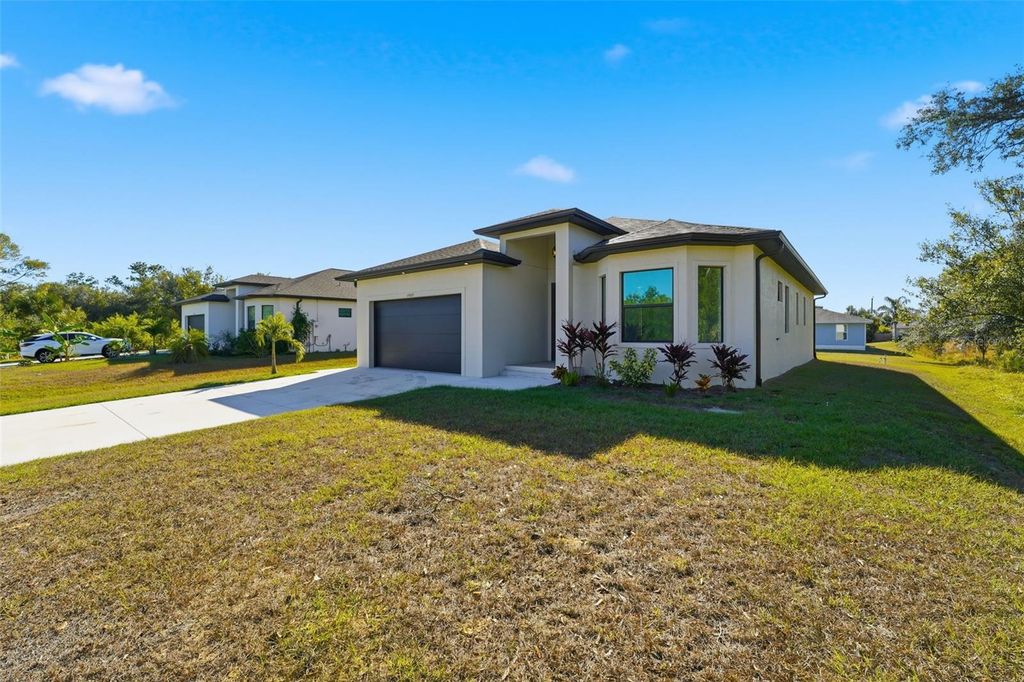 Photo of 12005 Carnival Avenue, Port Charlotte, FL 33981 (MLS # N6142116)