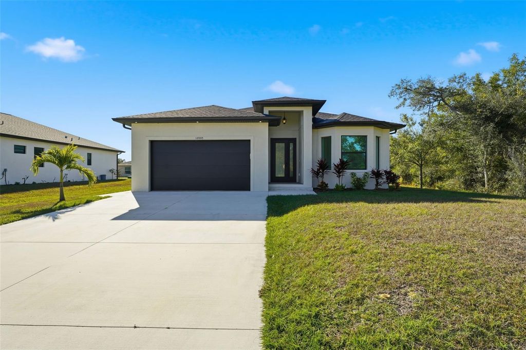 Photo of 12005 Carnival Avenue, Port Charlotte, FL 33981 (MLS # N6142116)