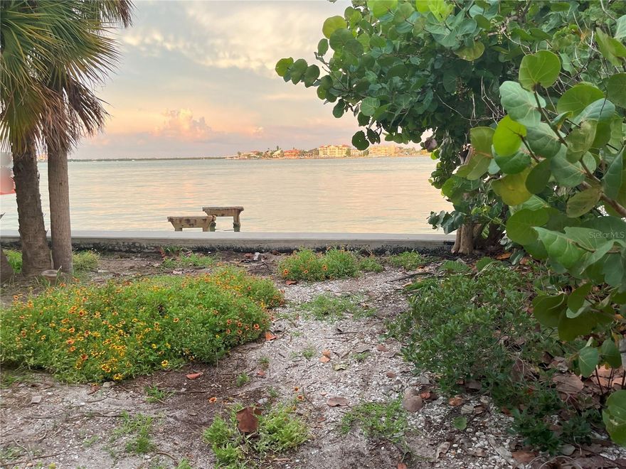 Sneak Peek of A Rare Gem in Pass-A-Grille.... 53.7 by 110ft of open waterfront abutting a highly coveted street end makes this a unique opportunity to become available to purchase as the current owners have enjoyed over 5 decades in this wonderful property. Easy access to the Gulf by boat and steps to the white sandy beaches. Wake to glorious sunrises each morning and if you're a cook you catch enthusiast, you'll enjoy great fishing without leaving the property. Located South of the Don CeSar. (SOTD) One will instantly notice the road narrowing as the iconic promenade of palm trees leads you to a truly special place. The charm of this old Florida-style community reveals itself to those with a sense of wonder, offering an unparalleled coastal lifestyle surrounded by natural beauty and historic appeal. Dont miss this exceptional chance to live in one of Floridas most iconic beach towns. Whether you're looking for a year-round residence, a vacation home, or a future investment property, this Pass-A-Grille treasure offers endless potential. If you've always wanted to preserve an Historic home, you will appreciate the original character elements and could even salvage them to include in your new construction home. Come experience the magic of this charming coastal community! Walk, Bike or Golf Cart to the old fishing village style restaurants and charming boutiques. Easy access off the island to enjoy the trendy restaurants, museums and Rays/Rowdies games. A quick 30 min drive to Tampa Airport makes business or casual travel a breeze.