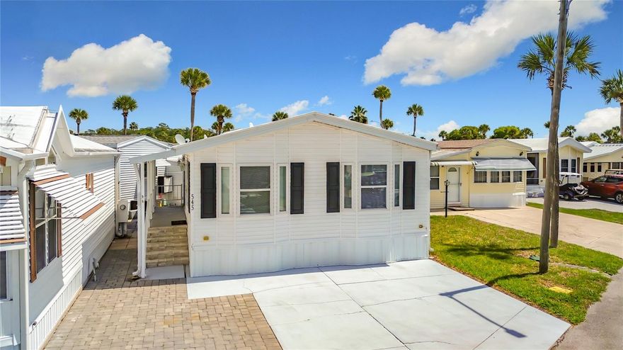 Welcome home to this beautifully maintained 2 bed, 2 bath, move in ready home in the beautiful community of Outdoor Resorts!! Parking for 2 vehicles plus a golf cart.  Home features: NEW windows 2022. Membrane roof. NO grey piping. Covered porch entrance. Laminate flooring throughout. Stackable washer & dryer is housed in the ensuite 2nd bathroom which benefits from a dedicated hot water heater while the first water heater services the kitchen and family bathroom. The updated kitchen offers new appliances:  smooth top stove, microwave and double door refrigerator with icemaker . This home must be seen to be truly appreciated. 
This wonderful resort offers a 24/7 guard gated front entrance and private access to a 179 acre lake - beautiful Lake Davenport. Outdoor Resorts offers amenities such as 2 heated swimming pools, boat dock, golf course & 9 hole putt-putt golf, tennis, pickleball, a two story clubhouse for entertainment during various seasonal events & so much more....The Association fee is only $768.00 PER QUARTER! which includes all your amenities, in addition to Cable TV, Community heated pools, Park Manager, Mowing, Sewer, Water and Trash! Come and enjoy this fantastic, affordable lifestyle! Please remember 55+, no VA or FHA, 1 pet rule. The park benefits from being close to medical facilities, restaurants & grocery stores. Don’t delay!! Put this home on your ‘must see list’ and ask to arrange a viewing today! ****