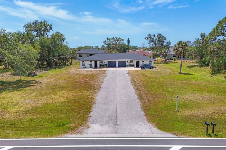 Completely modernized Income Producing Duplex (Units A & B )on ¾ acre property!   Zoned to add Two MORE DUPLEXES!  Survey available... Design and build a mini-complex in a highly sought area on Rotonda BLVD WEST.  Convenient location and easy exit out to Placida Rd on the West side of Englewood.  Short drive to Boca Grande or Manasota Key / Englewood Beach, fishing, dining, tiki-bars, live entertainment, public boat ramps, the Freedom Boat Club, a variety of golf courses, the Cape Haze Bike Trail and more.  Straight from their driveway, tenants can ride their bicycles or walk the trail.  City water & sewer!  Low annual HOA fees!  2022 Roof with a complimentary 2022 Wind Mitigation Report.  Both units have been completely updated with new kitchens and bathrooms / granite counter tops, new appliances, tile floors and freshly painted.  Each unit has an open floorplan and backyard 14 x 6 screened lanai facing the greenbelt with a 6 x 6 outdoor laundry space including the hot water heater dividing each porch.  The one car garages are built between the units providing a quiet buffer between the living spaces.   Vacation rentals are popular in the Rotonda community.  Get creative and design a seasonal getaway destination in Paradise.  This property presents an enticing income investment in a prime location. Call for a private showing and don’t miss a chance to capitalize on a unique opportunity!
