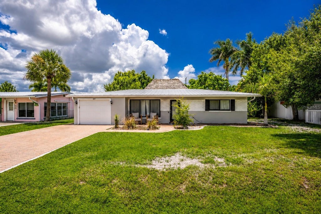 Photo of 409 W Ann Street, Punta Gorda, FL 33950 (MLS # C7529943)