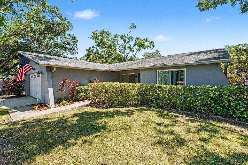 Photo of 5923 Dunfries St N, St Petersburg, FL 33709 (MLS # TB8502455)