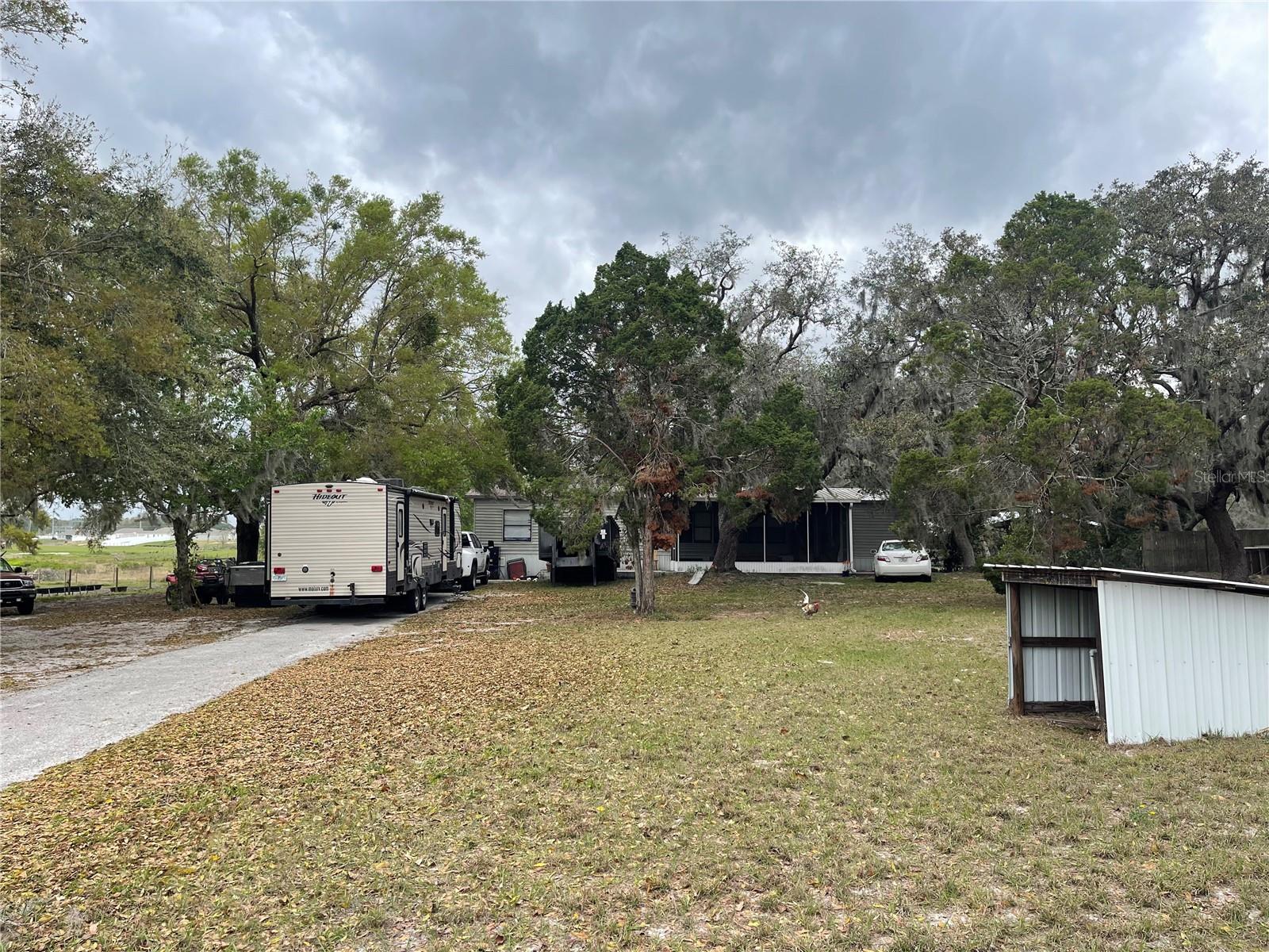 FL living at an affordable price or great investment property! This 3BD/2BA home is situated on 0.94 acres. Short distance to all shopping, schools, medical facilities, and restaurants. Make this your new winter retreat or year around home. Call today, don't miss this great investment opportunity.