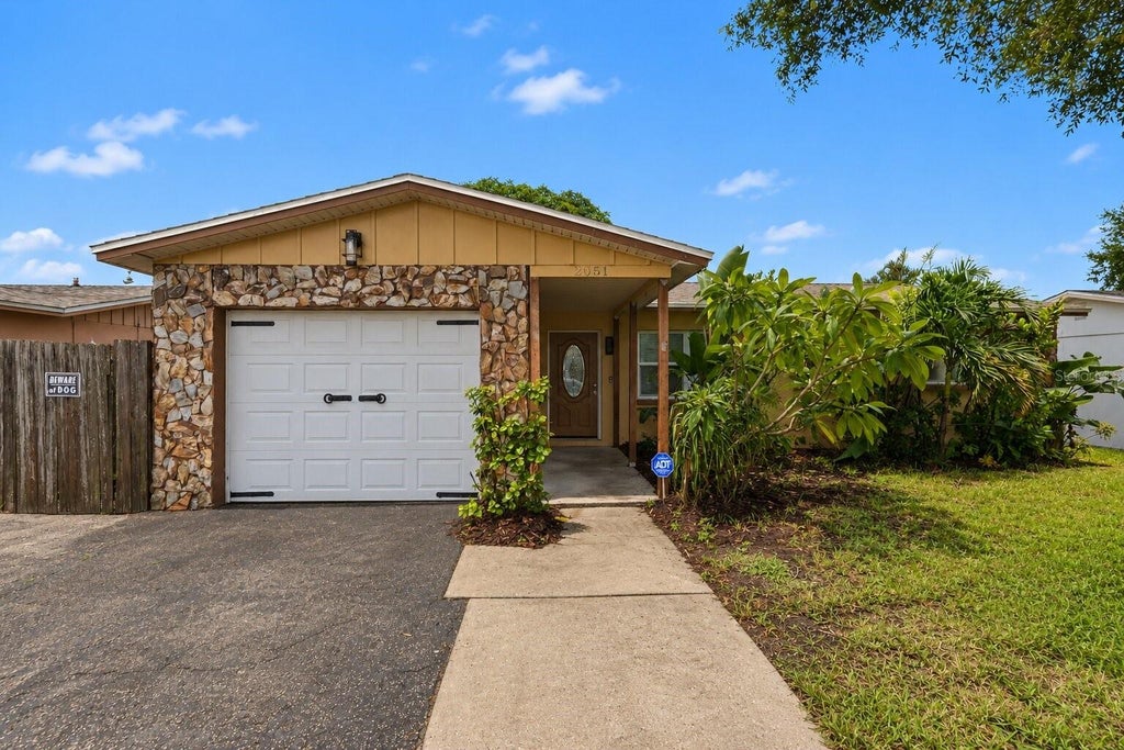 Photo of 2051 23rd Street SW, Largo, FL 33774 (MLS # O6437811)