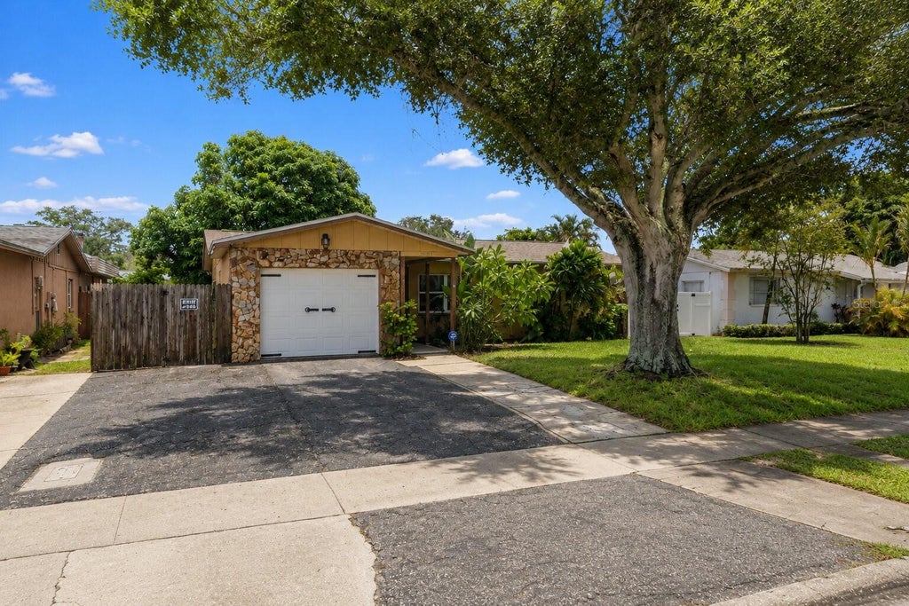 Photo of 2051 23rd Street SW, Largo, FL 33774 (MLS # O6437811)