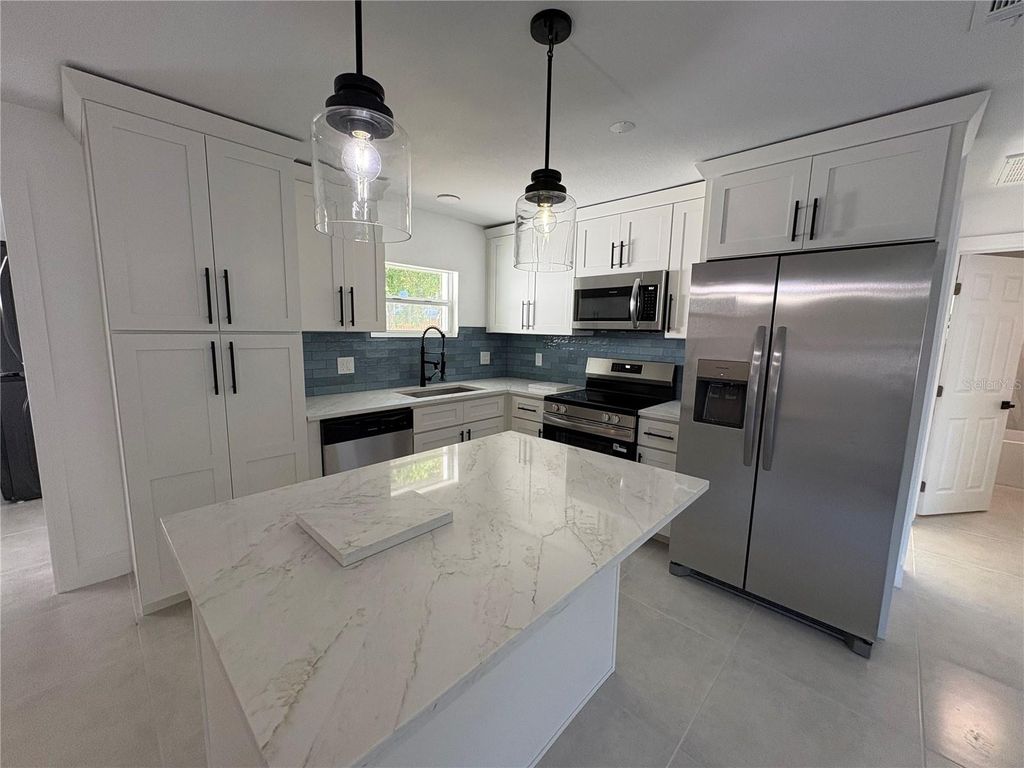 Photo of 800 Saint Petersburg Drive W, Oldsmar, FL 34677 (MLS # TB8489139)