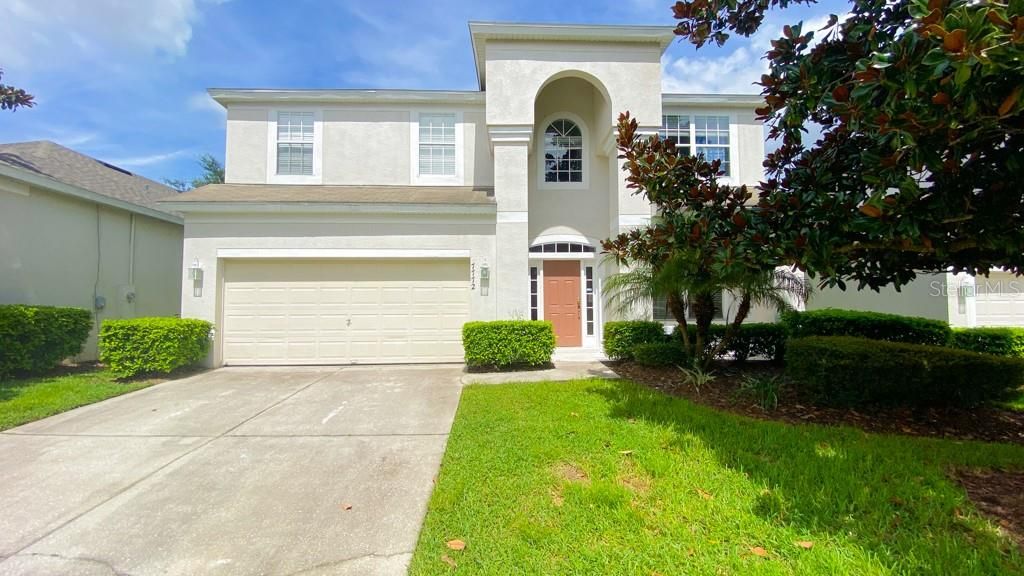 Photo of 7772 Basnett Circle, Kissimmee, FL 34747 (MLS # O6368643)