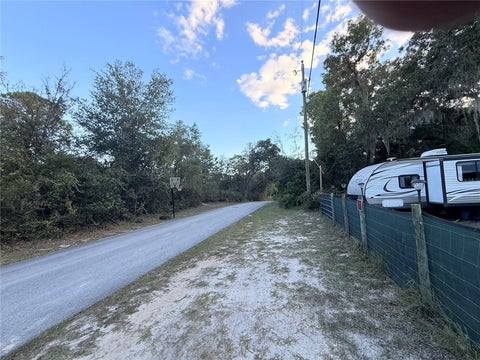 Photo of 10666 S Mandelay Loop, Homosassa, FL 34448 (MLS # TB8561165)