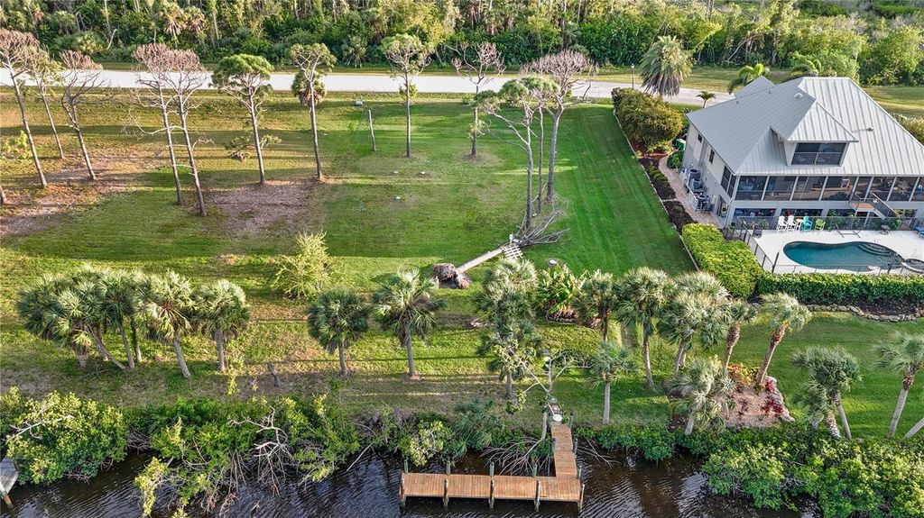 Photo of 10180 Creekside Drive, Placida, FL 33946 (MLS # C7521722)