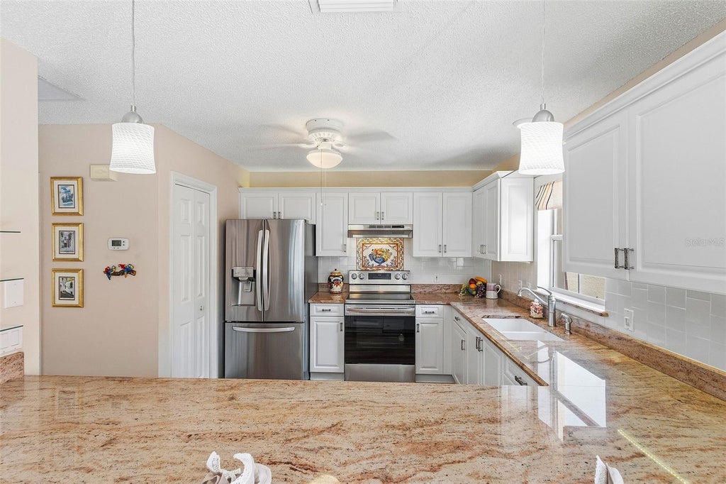 Photo of 867 Oviedo Road, Lady Lake, FL 32159 (MLS # G5113282)