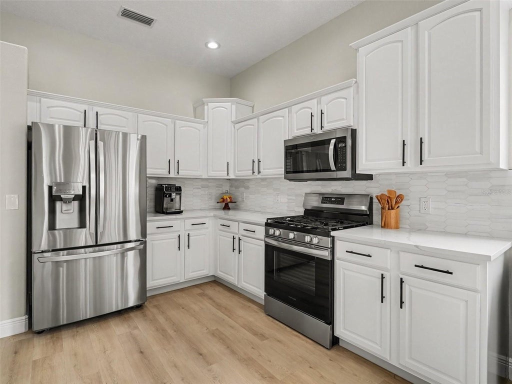 Photo of 14146 Cattle Egret Pl, Lakewood Ranch, FL 34202 (MLS # TB8531592)