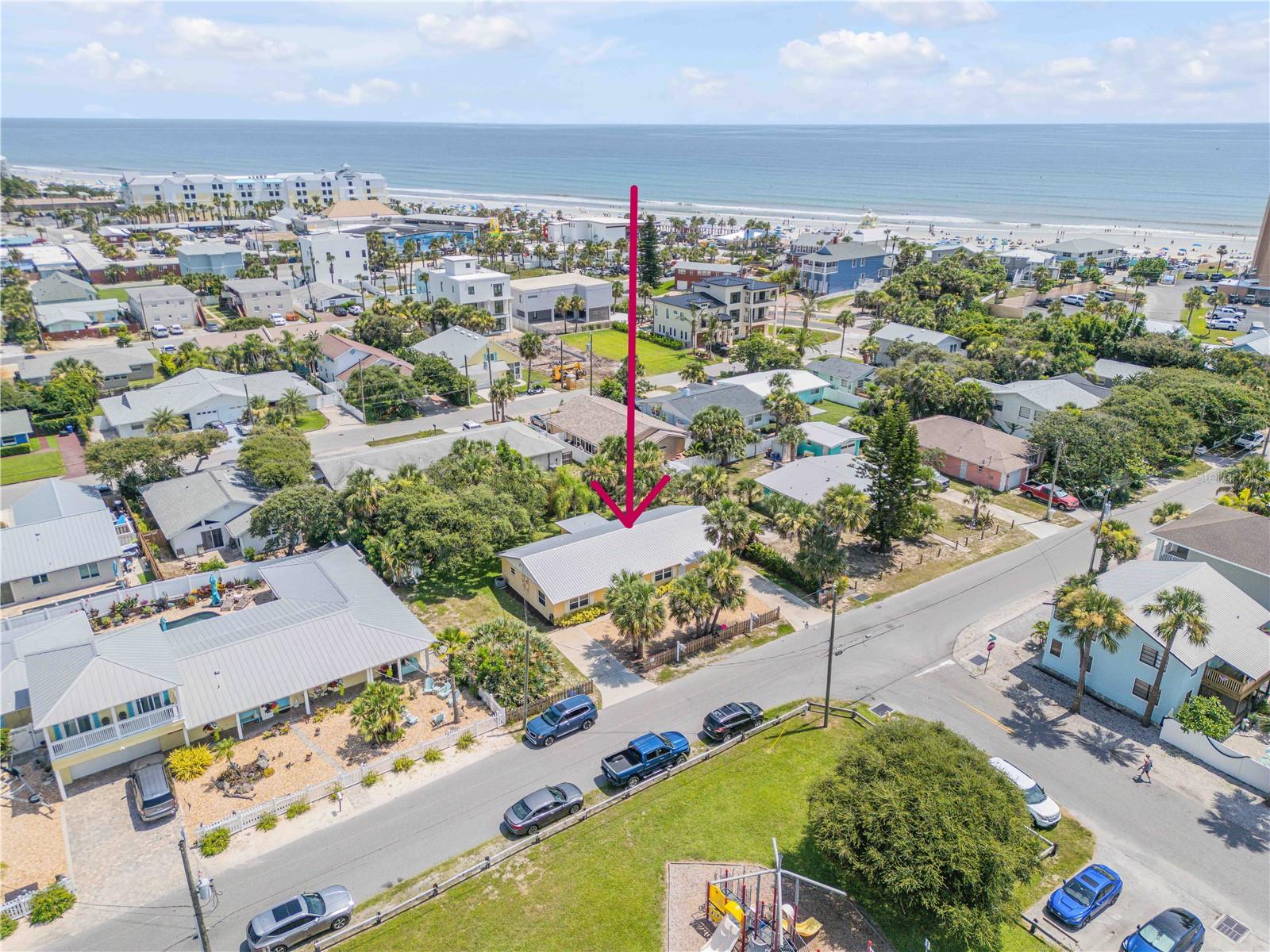 Beautiful beachside Duplex! Each side has 2 Bdr, 1ba, living room, kitchen, back patio, laundry room, and spacious back yard (total of 4bdrs, 2ba). This is a concrete block structure with a metal roof. Great investment and easily rented as it is across from the city owned tennis courts and playground, a block to the beach, and only a couple blocks walk to Flagler Ave shopping, dining and entertainment. Easy to view, here is a great opportunity to have monthly income! Beach walkover is about 1 1/2 blocks east. This is a perfect location for 30 day or longer term rentals or live in one side and rent out the other.