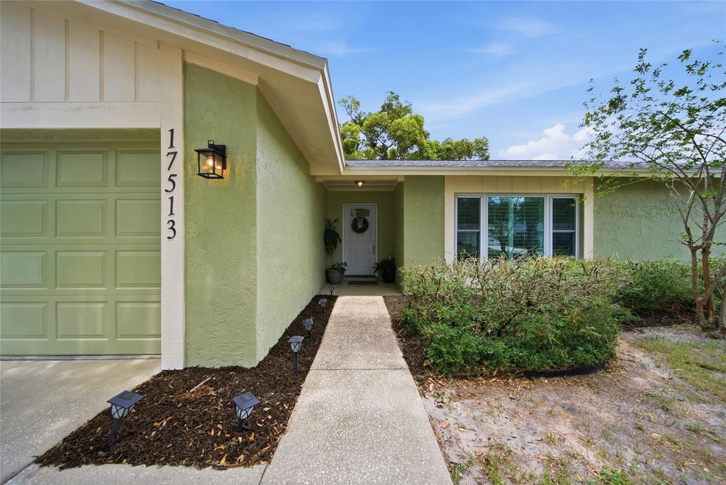 Photo of 17513 Shadyside Circle, Lutz, FL 33549 (MLS # TB8518345)