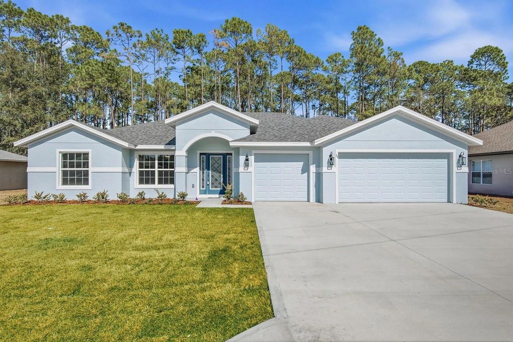 Photo of 27 Egret Trail, Palm Coast, FL 32164 (MLS # FC319772)