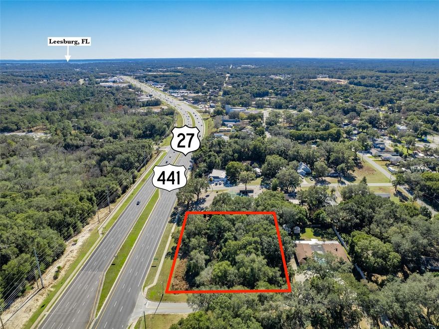 Offering is 1.28+/- Acres directly on US Hwy 441 / 27 at the Corner of E Catawba in Fruitland Park. Property is zoned C-2, in the City of Fruitland Park, City Utility's available,  280+/- FT of Hwy frontage with FDOT 40,500+/- Avg trips per Day, Excellent visibility with easy access.
Fruitland Park is located on the edge of The Villages and less than an hour to Orlando or Ocala and minutes to the Florida Turnpike. Location is also located across from the Lake Griffin State Park which is part of the Harris Chain of Lakes and offers campgrounds, kayaking and nature trails. Site is an assemblage of two parcels - Lake County Fl Alt Key #'s 1068223 & 1434343. Bring your builder and walk the site for your new office / retail / professional building.    All information herein is believed accurate and correct but not guaranteed or warranted and subject to change without notice.