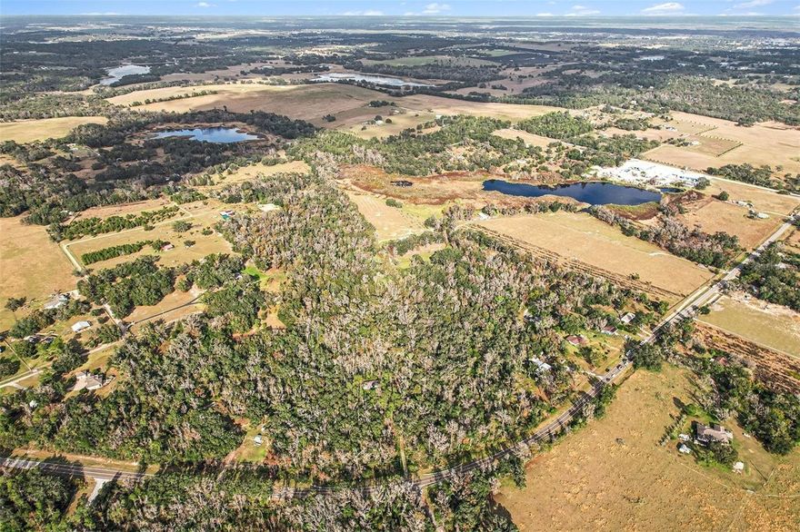 Exciting opportunity to own over 7 acres of usable land in beautiful Dade City! Zoned for Agricultural or Residential use, this versatile property comes with no deed restrictions and no HOA, giving you the freedom to bring your vision to life. The property consists of two parcels conveying together, a 5.9-acre parcel with an attached 1.21-acre lot, totaling 7.11 acres — offering flexibility for a custom home, agricultural lifestyle, smart investment, or long-term hold (buyer to verify future use and subdivision potential). Ideally located near San Antonio, Dade City, and Zephyrhills, this property blends peaceful country living with convenient access to growing residential and rural communities. Large acreage like this is increasingly rare in a high-demand area—don’t miss your chance to secure it.