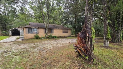 Photo of 18426 Powell Road, Brooksville, FL 34604 (MLS # TB8442224) Photo of 18426 Powell Road, Brooksville, FL 34604 (MLS # TB8442224)