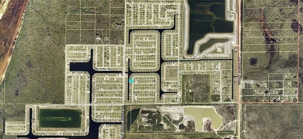 Photo of 3836 NW 40th Avenue, Cape Coral, FL 33993 (MLS # C7526126)