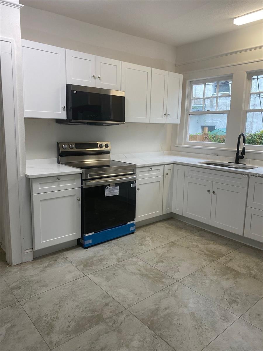 Photo of 606 Lake Dot Circle #D, Orlando, FL 32801 (MLS # O6440722)