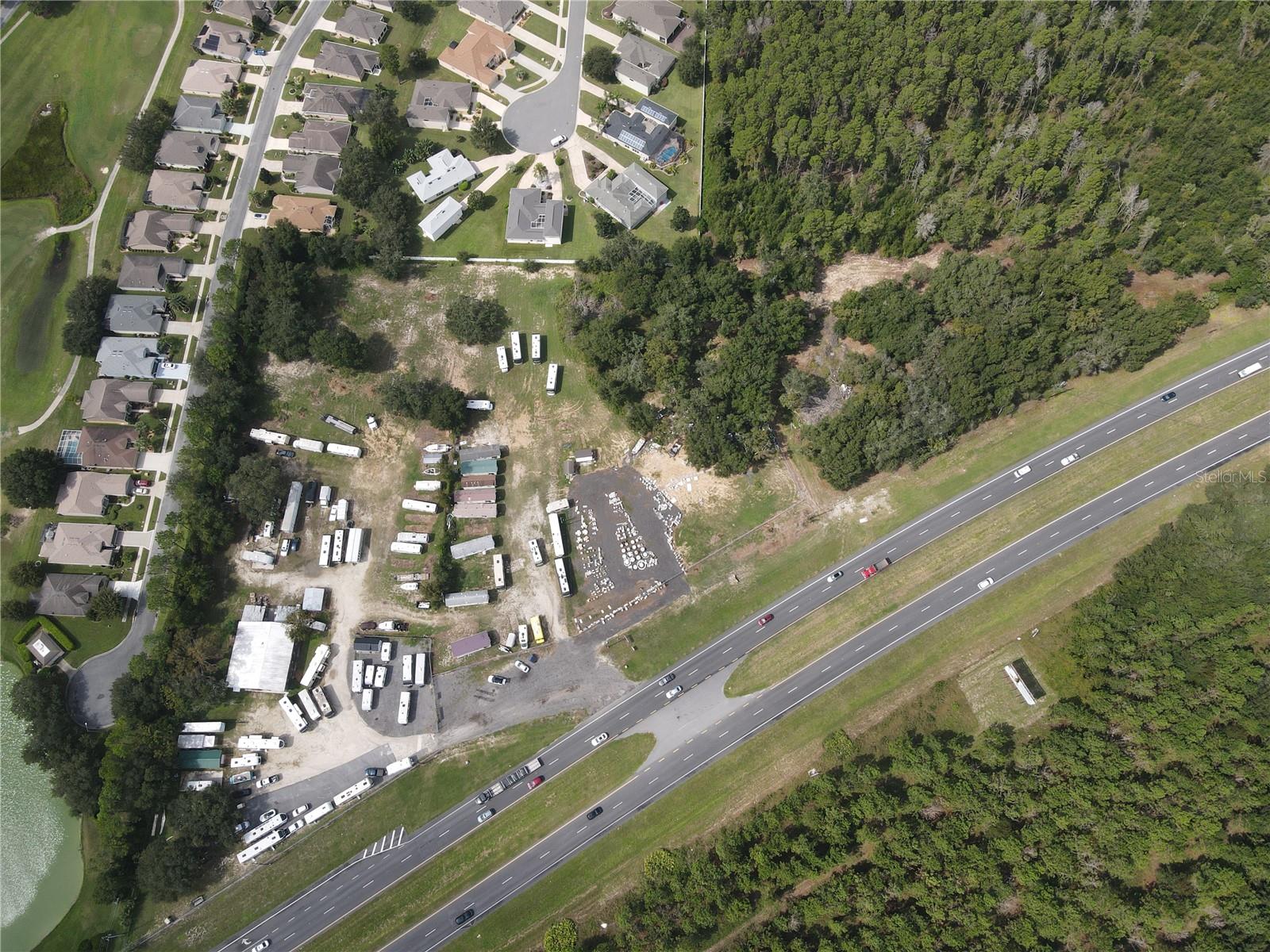 1.9-Acre Commercial Parcel – Excellent Investment in a High-Growth Area. This vacant commercial property is an exceptional opportunity for businesses looking to establish a presence in Leesburg’s rapidly expanding commercial hub. This property offers high visibility and accessibility with 1,200 feet of highway frontage on US Hwy 27, making it an ideal site for large-scale commercial projects, such as medical clinics, shopping centers, boutique hotels, or mixed-use developments. Located within minutes of Publix, Walgreens, McDonald’s, and other major retailers, the area is set to experience significant growth of residential units planned nearby. Owner financing is available act now to secure this prime location!
Lot Size: 1.9 acres