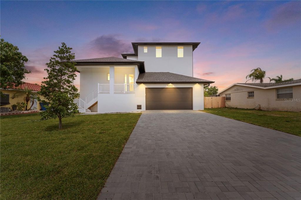 Photo of 9832 Island Harbor Drive, Port Richey, FL 34668 (MLS # TB8429623)