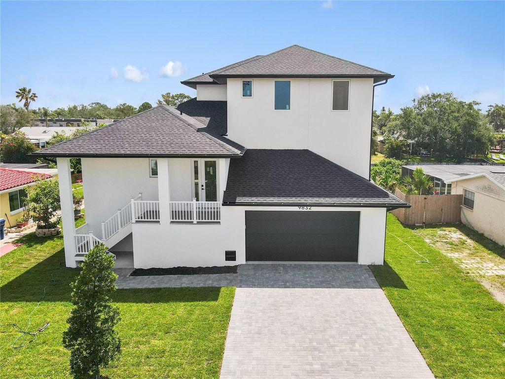 Photo of 9832 Island Harbor Drive, Port Richey, FL 34668 (MLS # TB8429623)