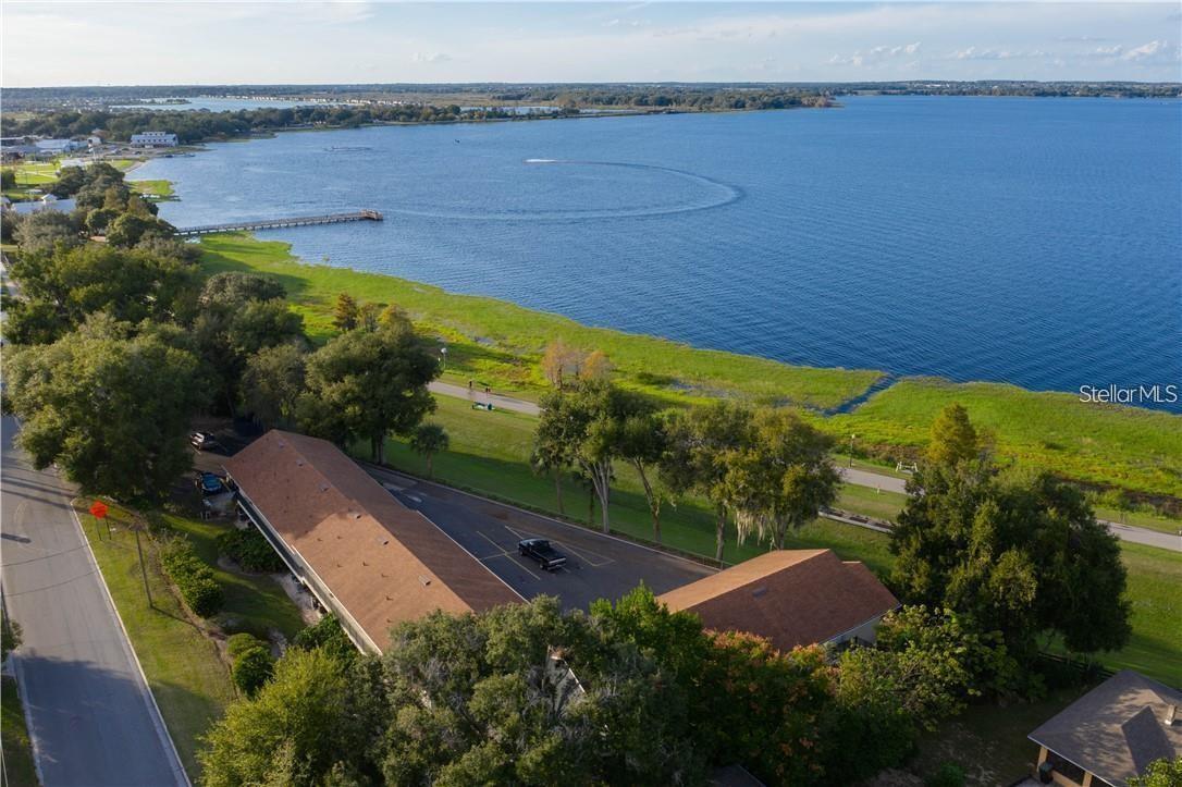 Enjoy Lake Front living on Lake Minneola and the West Coast Bike and Hiking Trail, also known as the Coast-to-Coast Trail. Just walk out your front door and YOU have the perfect view of the lake and trail with access, from this first floor corner unit!! This sweet 2/2 has been recently painted, newer appliances, new lights and fans, windows and window treatments! Easy walk to downtown Clermont and all the events, restaurants and shops that this great town has available!! Get ready for sunshine and Florida living at its best! Whether you are a snowbird or athlete or just want to enjoy the Lake front and downtown Clermont, this condo is PERFECT!
Sorry no pets allowed by association rules. Don't miss this great opportunity and location!