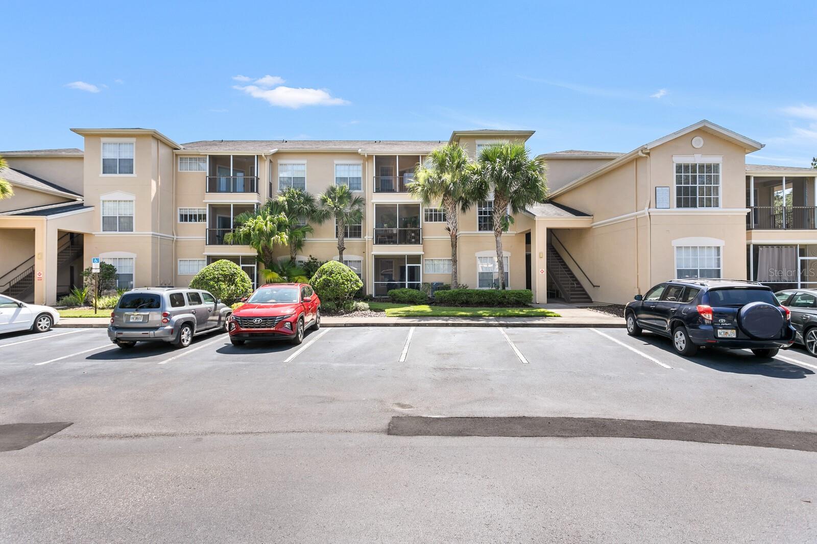 Florida Living at Its Finest! Welcome to this beautiful first-floor corner unit located in the gated community of Oxford Place in Tampa Palms. This exciting new listing offers 1 bedroom, 1 full bathroom, a 1-car ATTACHED garage and over 800 square feet of living space. Step inside to an open-concept floor plan filled with natural sunlight. The chef’s kitchen features warm maple cabinetry, a breakfast bar, ceramic tile flooring, and a separate dining area that flows seamlessly into the spacious great room. The master retreat includes an en suite bathroom and ample closet space. Additional features include a generous storage closet in the foyer and a full-size laundry room equipped with a washer, dryer, and extra shelving for your convenience. The 1-car garage offers plenty of storage space as well. Step outside onto your private screened lanai and enjoy the warm summer breeze! Oxford Place residents enjoy resort-style amenities, including a sparkling pool, clubhouse, fitness center, volleyball court, playground, valet trash service, and a newly renovated car wash with two bays, vacuum and tire pressure hose, and an electric car charging station. As a resident, you also have access to Club Tampa Palms just down the street, offering a heated pool and spa, full fitness center with locker rooms, showers, and sauna, meeting rooms, kitchen and bar, plus lighted tennis and basketball courts. Yes, you truly can have it all! This community is ideally located near I-75, USF, shopping, and dining. Your monthly condo fees cover access to all of these exceptional amenities. Welcome home to Oxford Place!