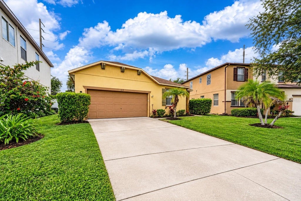Photo of 217 Sand Ridge Drive, Davenport, FL 33896 (MLS # TB8547124)