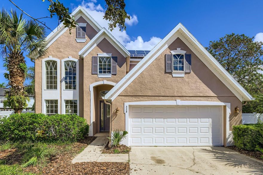 Welcome to this beautifully maintained two-story 3 bedroom 2 bathroom home nestled in a quiet, gated residential community with convenient access to shopping, dining, and Highway 438. This spacious home offers exceptional features and thoughtful design throughout. Step inside to find an open and inviting main level with durable tile flooring, a dramatic two-story dining room perfect for entertaining, and a large living room with built-in shelving for stylish storage and display. The chef’s kitchen is a true standout, featuring stone countertops, stainless steel appliances, ample cabinetry, a walk-in pantry, and a convenient butler’s pantry that adds both function and charm. Upstairs, retreat to the generous primary suite complete with an ensuite bathroom offering dual vanities, a soaking tub, a separate shower, and a large walk-in closet. Two additional bedrooms, a full bathroom, and a versatile loft/landing area provide plenty of space for bedrooms, guests, or a home office. Enjoy outdoor living year-round on the covered and screened back patio, complete with a built-in hot tub—perfect for relaxing after a long day. The fully fenced backyard adds privacy and space for pets or play. Additional highlights include a deep two-car garage and a main-level half bath for guests. Don’t miss your chance to own this exceptional home in a sought-after location!