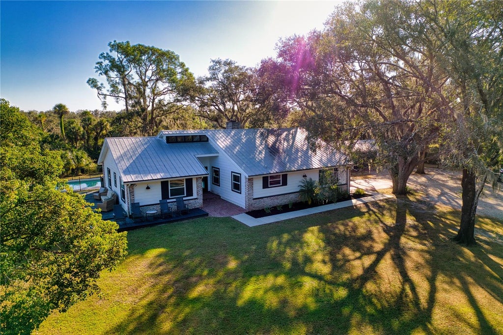 Photo of 5310 Jim Davis Road, Parrish, FL 34219 (MLS # TB8521240)